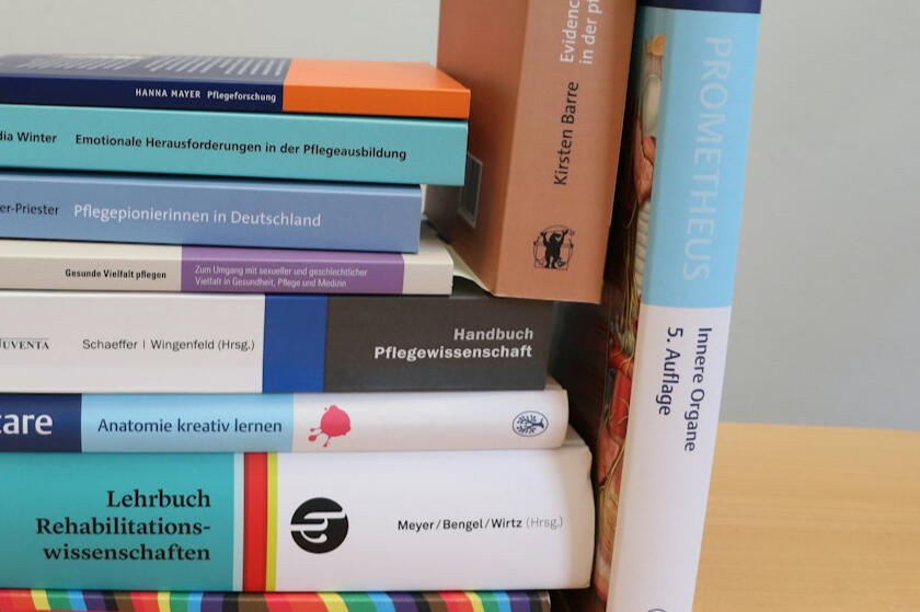 Stack of modern paperback books